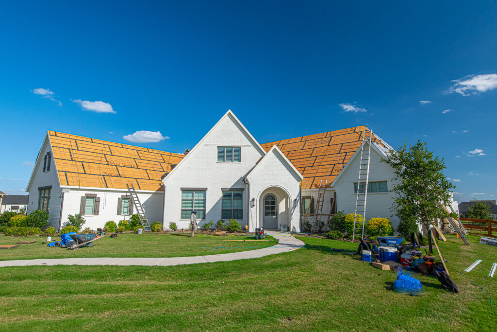 Fortified roof installation with seam tape applied