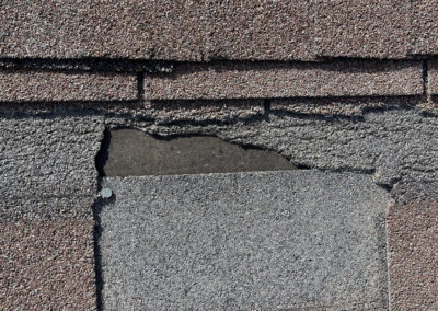 A badly damaged shingle